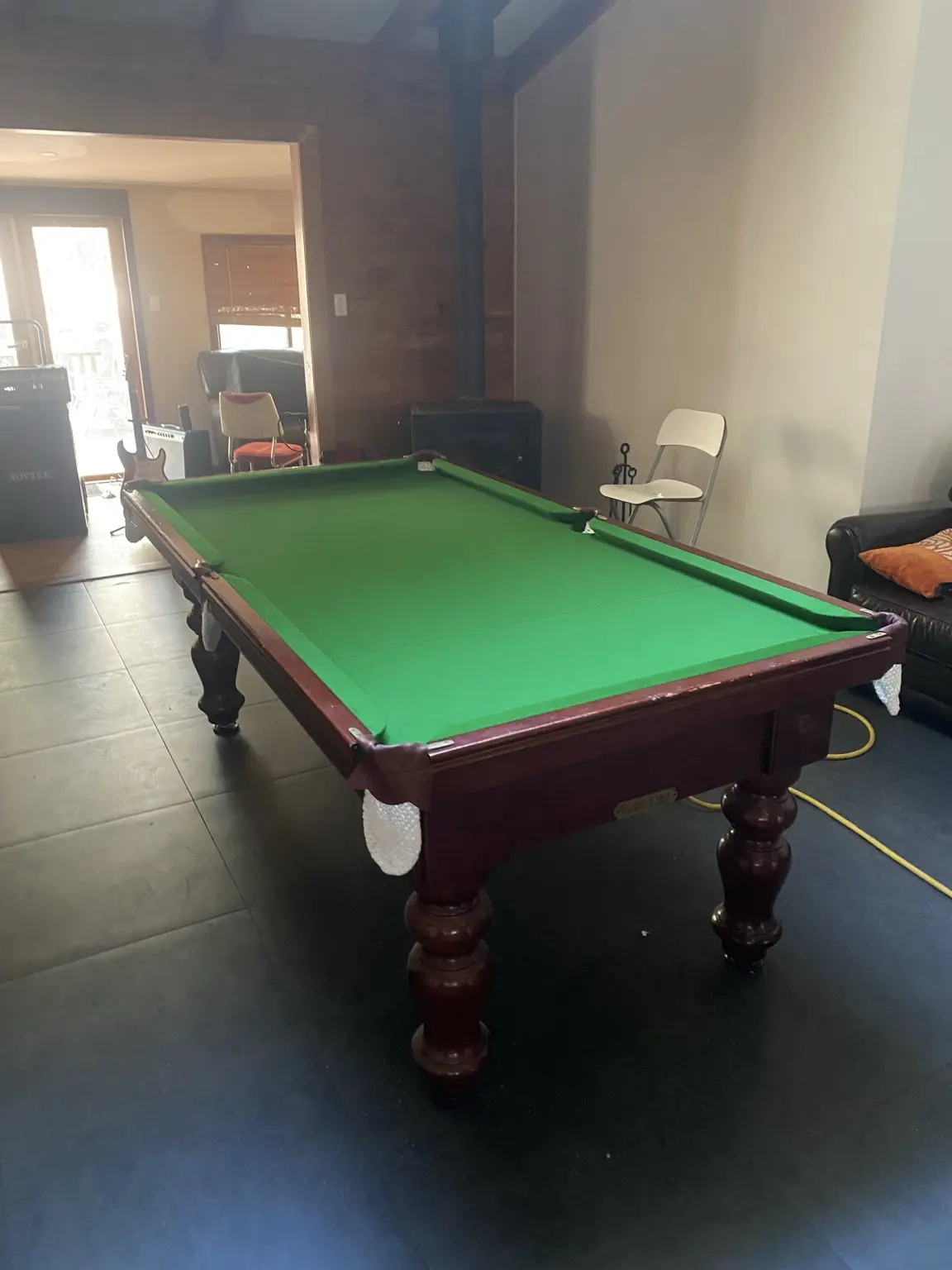 Green cloth timber pool table after service